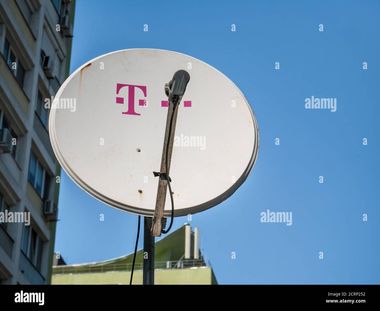 Bucharest/Romania - 09.05.2020: Satellite dish with the logo of the German telecommunications company Telekom Stock Photo