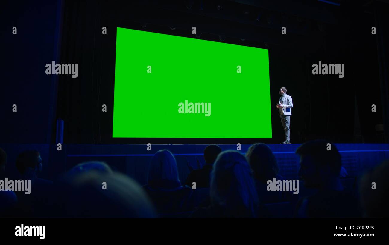 Keynote Speaker Announces New Product to the Audience, Behind Her Movie  Theater with Green Screen, Mock-up, Chroma Key. Female CEO Shows Leadership  on Stock Photo - Alamy