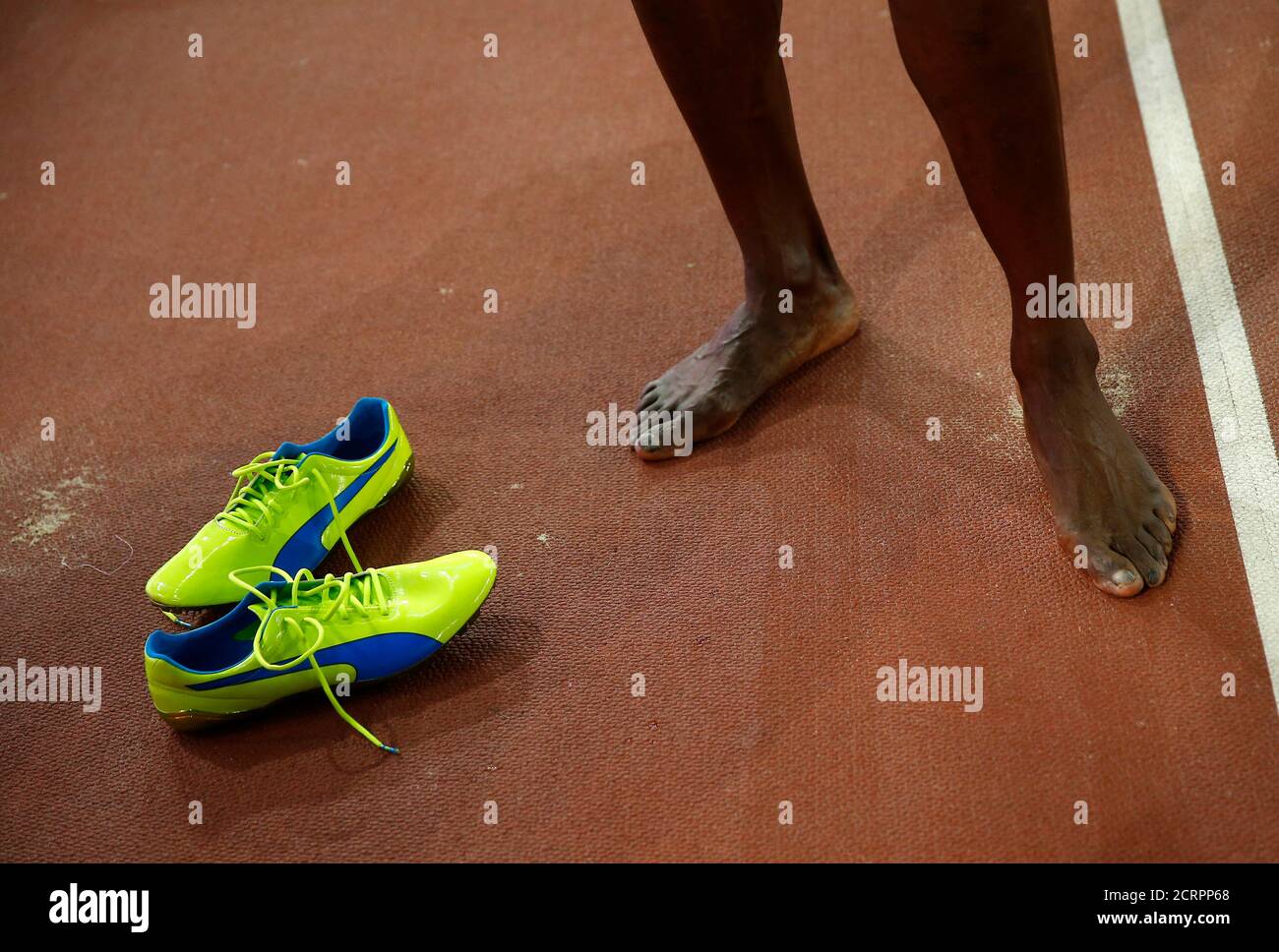 the-feets-and-shoes-of-usain-bolt-of-jamaica-after-he-won-the-mens-200-metres-final-during-the-15th-iaaf-world-championships-at-the-national-stadium-in-beijing-china-august-27-2015-reuterskai-pfaffenbach-2CRPP68.jpg