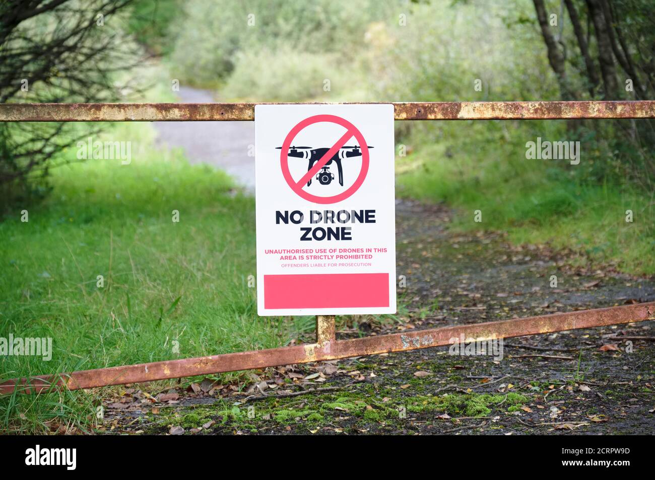 No Drone zone sign at army defence grounds no flying permitted air zone Stock Photo