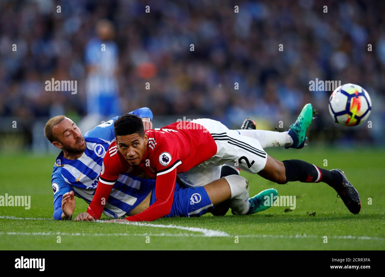 Soccer Football - Premier League - Brighton & Hove Albion v Manchester United - The American Express Community Stadium, Brighton, Britain - May 4, 2018 Manchester United's Chris Smalling in action with Brighton's Glenn Murray REUTERS/Eddie Keogh EDITORIAL USE ONLY. No use with unauthorized audio, video, data, fixture lists, club/league logos or "live" services. Online in-match use limited to 75 images, no video emulation. No use in betting, games or single club/league/player publications. Please contact your account representative for further details. TPX IMAGES OF THE DAY Stock Photo