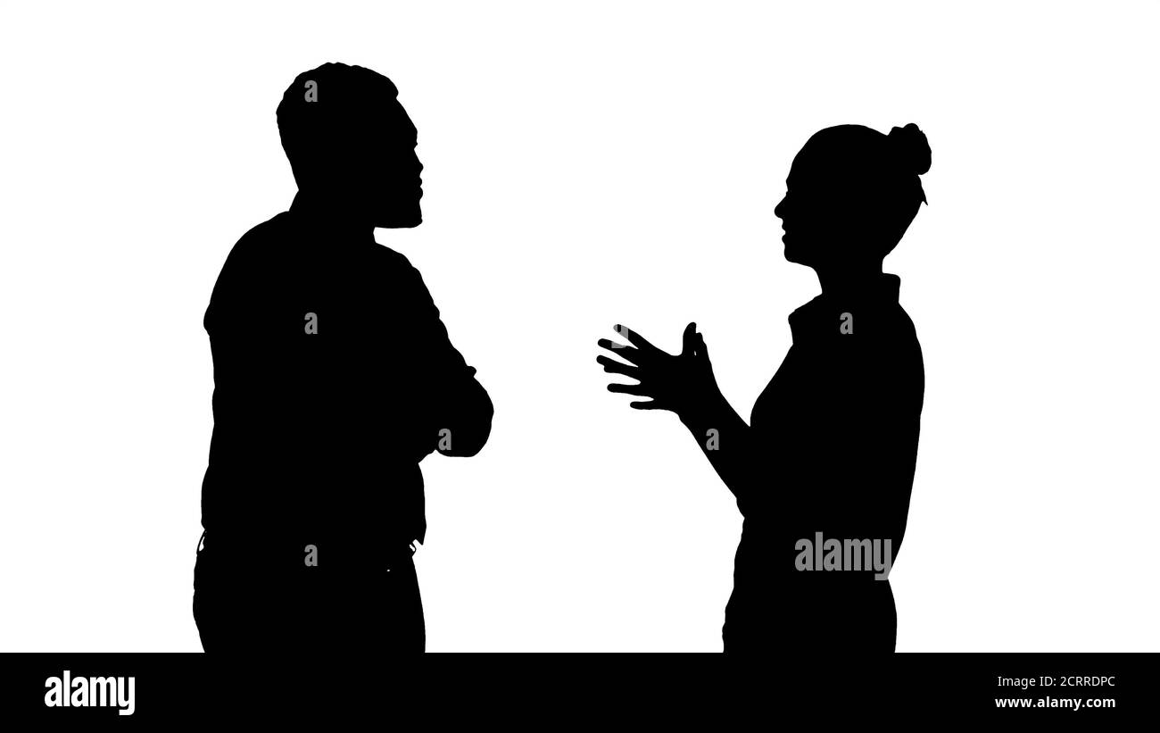 Silhouette Business woman giving some ideas to her boss. Stock Photo
