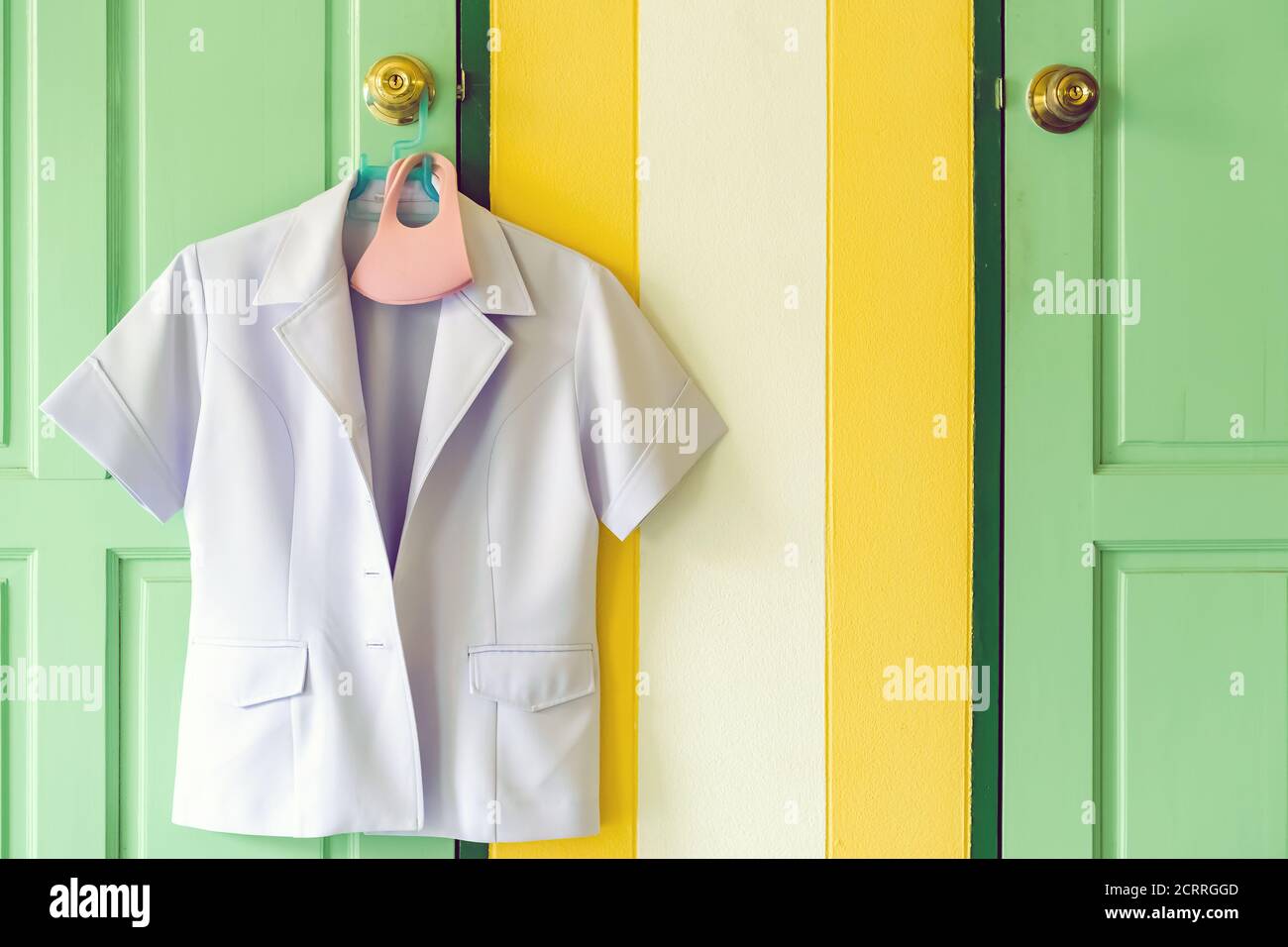 Medical uniform clothing on hunger in a shop Stock Photo - Alamy