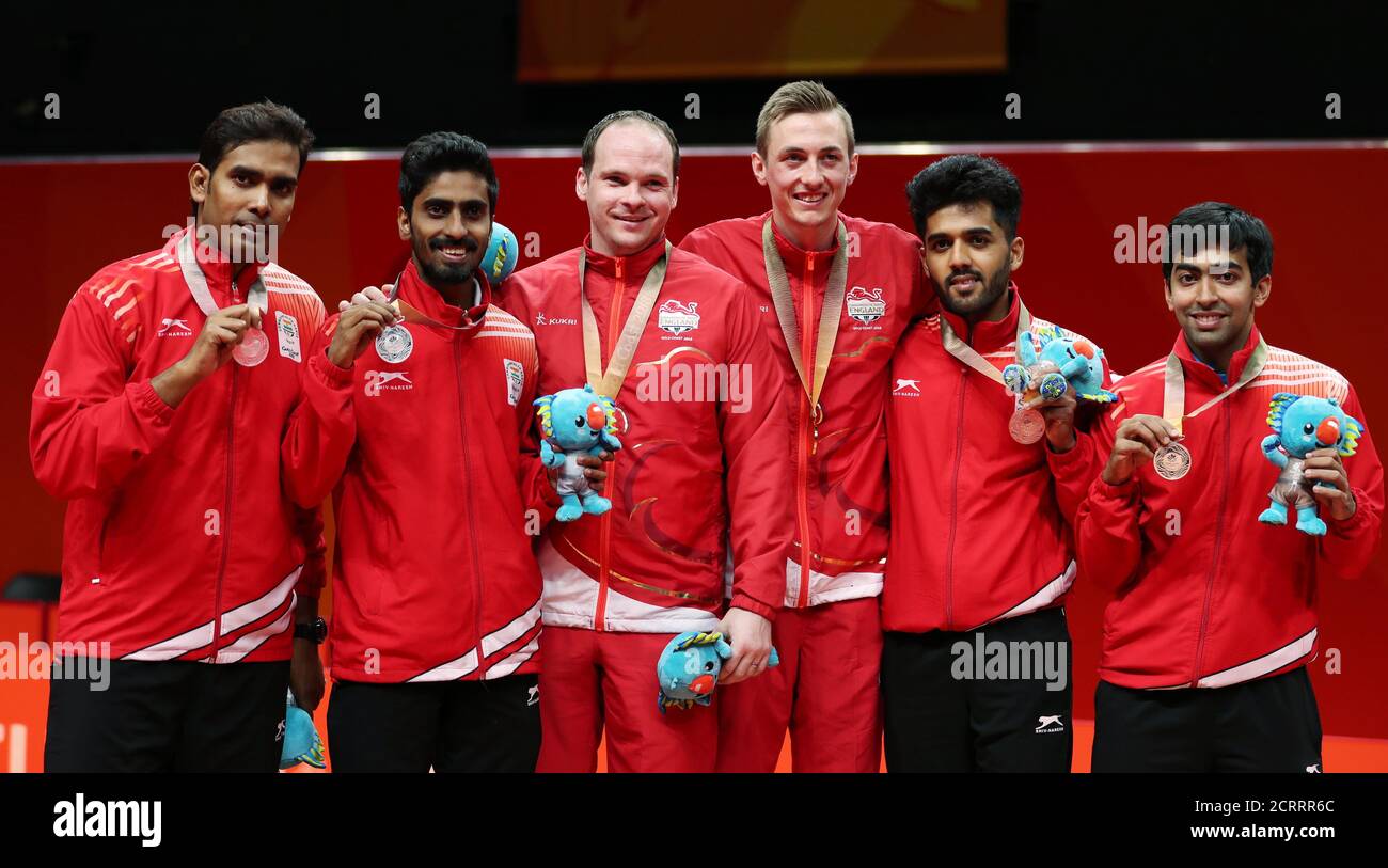 Table Tennis - Gold Coast 2018 Commonwealth Games - Men's Doubles Medal  Ceremony - Oxenford Studios - Gold Coast, Australia - April 14, 2018. Gold  medalists Paul Drinkhall and Liam Pitchford of