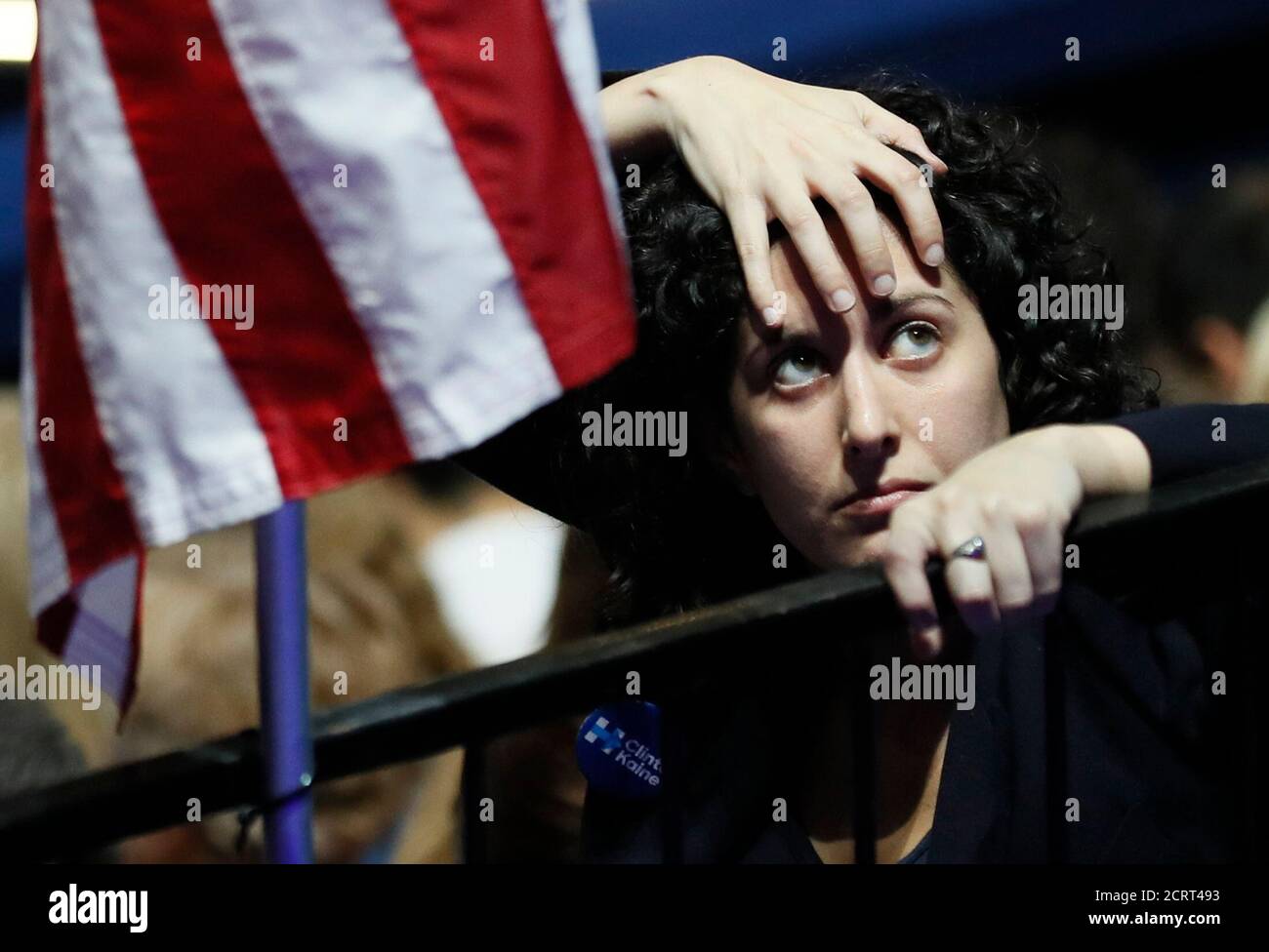 A supporter of Democratic U.S. presidential nominee Hillary Clinton watches results at the election night rally in New York, U.S., November 8, 2016. REUTERS/Rick Wilking Stock Photo