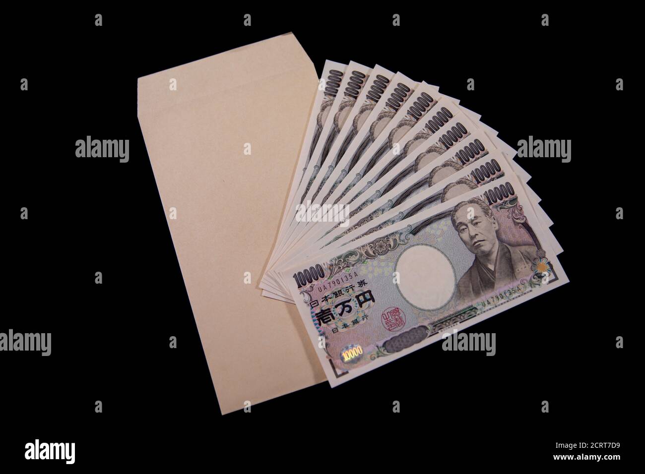 Japanese currency 100,000 yen with envelope on the black background Stock  Photo - Alamy