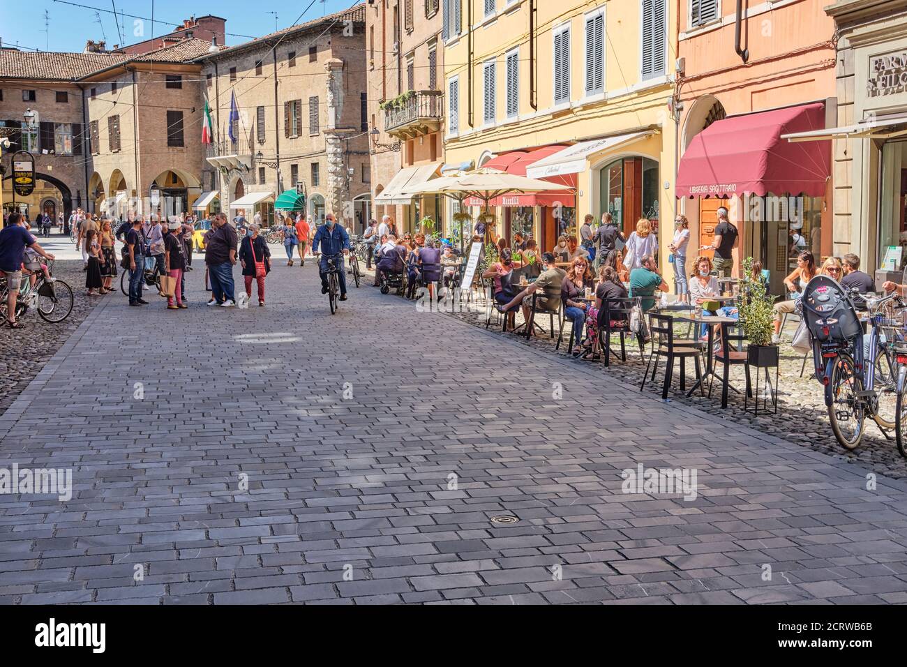 Modena, Italy - June 13 2020: Outdoor city life on a sunny day in the days of COVID-19 Stock Photo