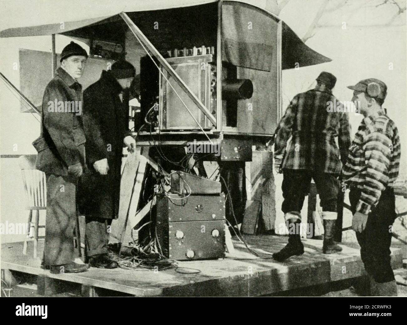 . Bell telephone magazine . t was to complete its as-sembly and tuning up at Whip-pany, then to make performance testsand adjustments at the Highlandstest house. When the equipment wasfound to meet the Navys perform-ance requirements, it was taken tothe Naval Research Laboratory forfinal evaluation. Successful performance tests of thenew equipment were made here inJune, 1939. At that time sharp andstable echo signals were obtainedfrom nearby ships, from buildings on 1945-46 Radar and Bell Laboratories 229 Sandy Hook, and from gas tanks inBrooklyn—some twenty miles dis-tant. Testing and improve Stock Photo