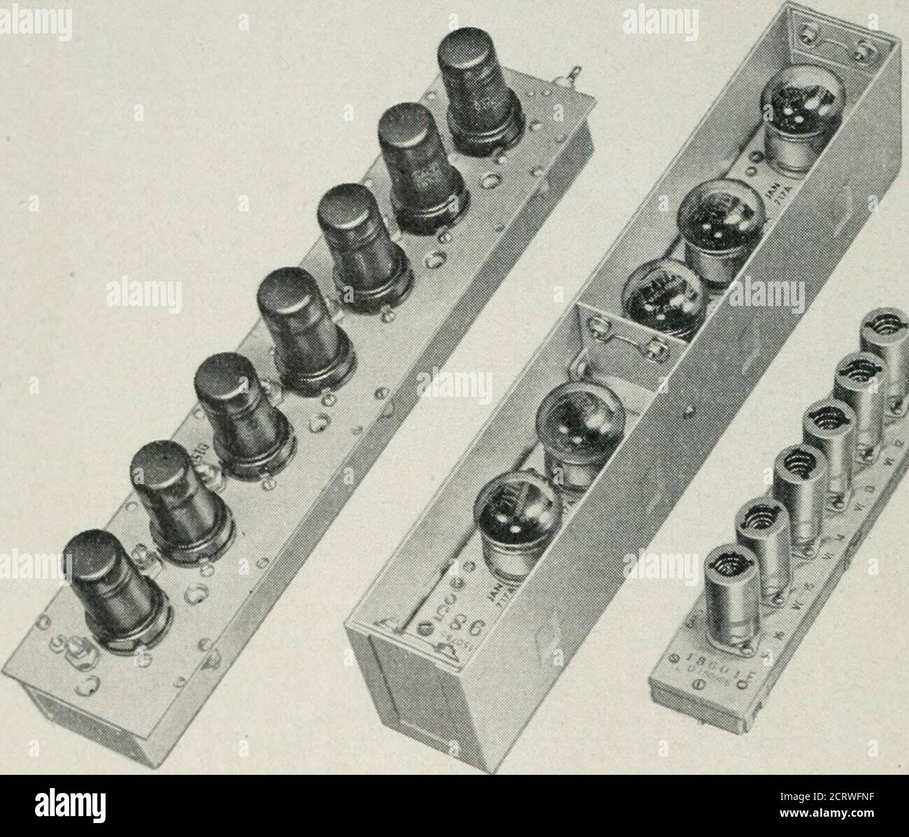 . The Bell System technical journal . 23. In thisdesign the 6AK5 tube is employed and single-tuned interstages and auto-transformer input and output networks are employed; however, the generalarrangement is quite similar to the design previously described. The remainder of the IF amplifier gain required is of the order of 80 to  746 BELL SYSTEM TECHNICAL JOURNAL 100 db which is usually provided in a main IF amplifier that can be locatedconveniently within the receiver indicator portion of the radar system. Themain IF amplifier is commonly designed as a complete shielded unit, requiredby the h Stock Photo