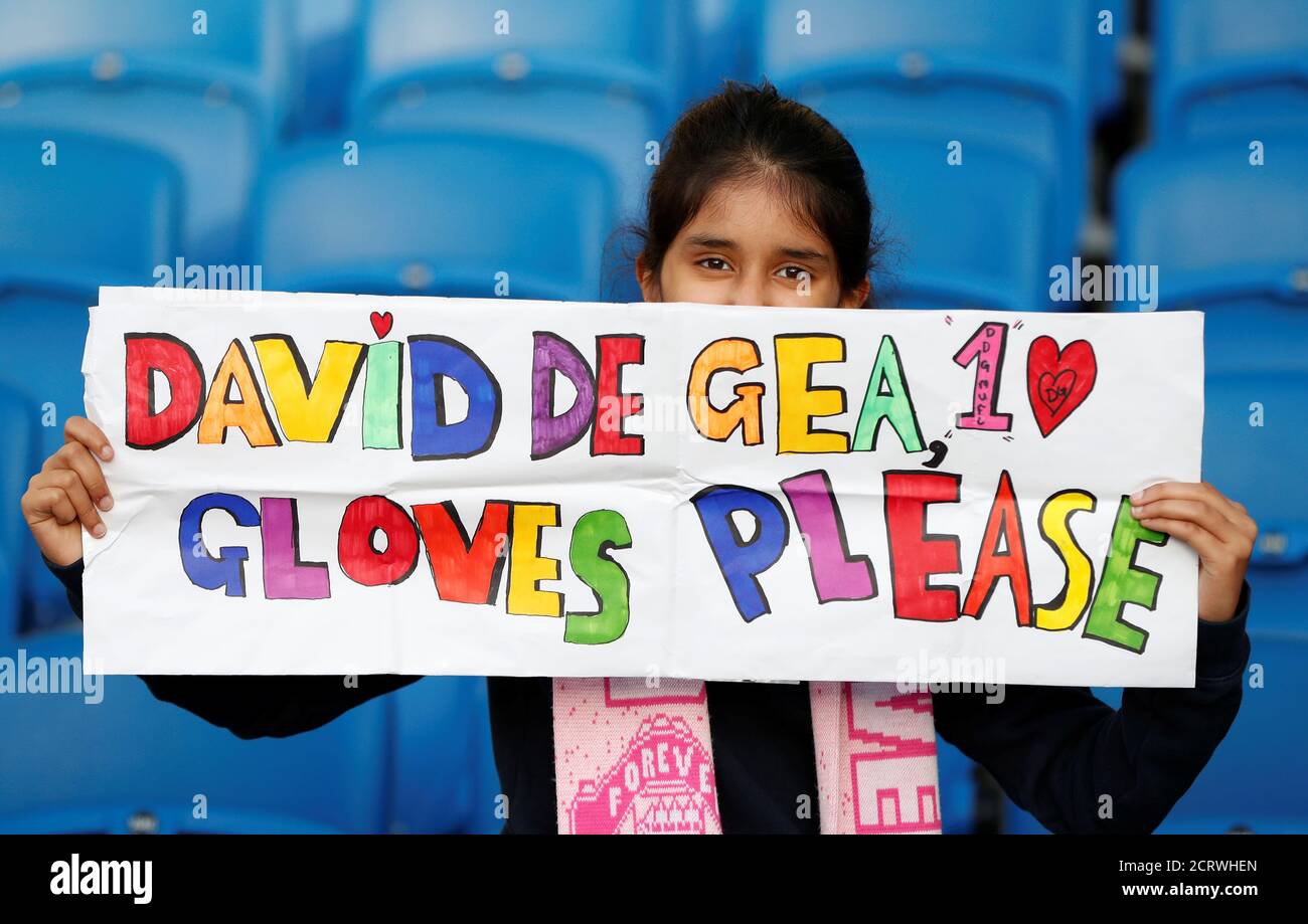 Soccer Football - Premier League - Brighton & Hove Albion v Manchester United - The American Express Community Stadium, Brighton, Britain - May 4, 2018   Manchester United fan with a sign for David De Gea before the match    Action Images via Reuters/Paul Childs    EDITORIAL USE ONLY. No use with unauthorized audio, video, data, fixture lists, club/league logos or 'live' services. Online in-match use limited to 75 images, no video emulation. No use in betting, games or single club/league/player publications.  Please contact your account representative for further details. Stock Photo