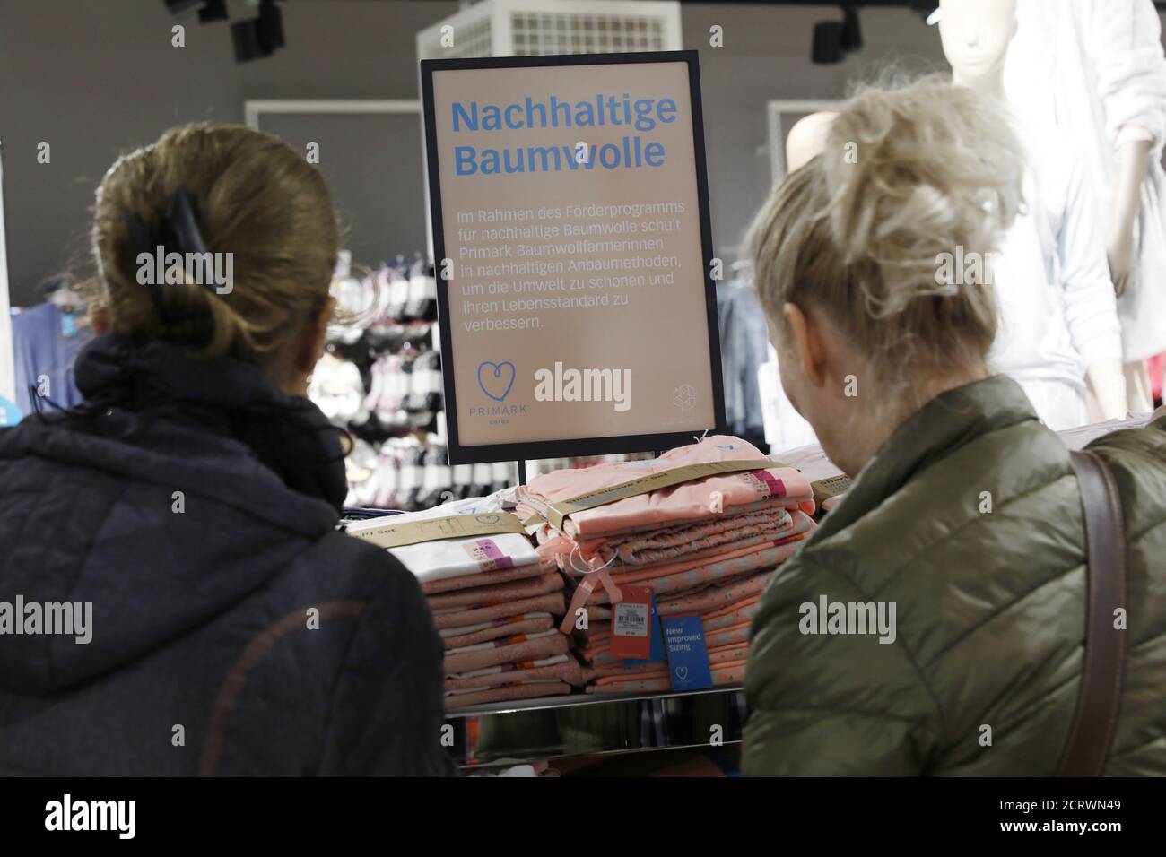 Customers look at organic cotton pijamas in the new Primark store during  its opening day in Berlin, Germany October 18, 2018. REUTERS/Michele  Tantussi Stock Photo - Alamy