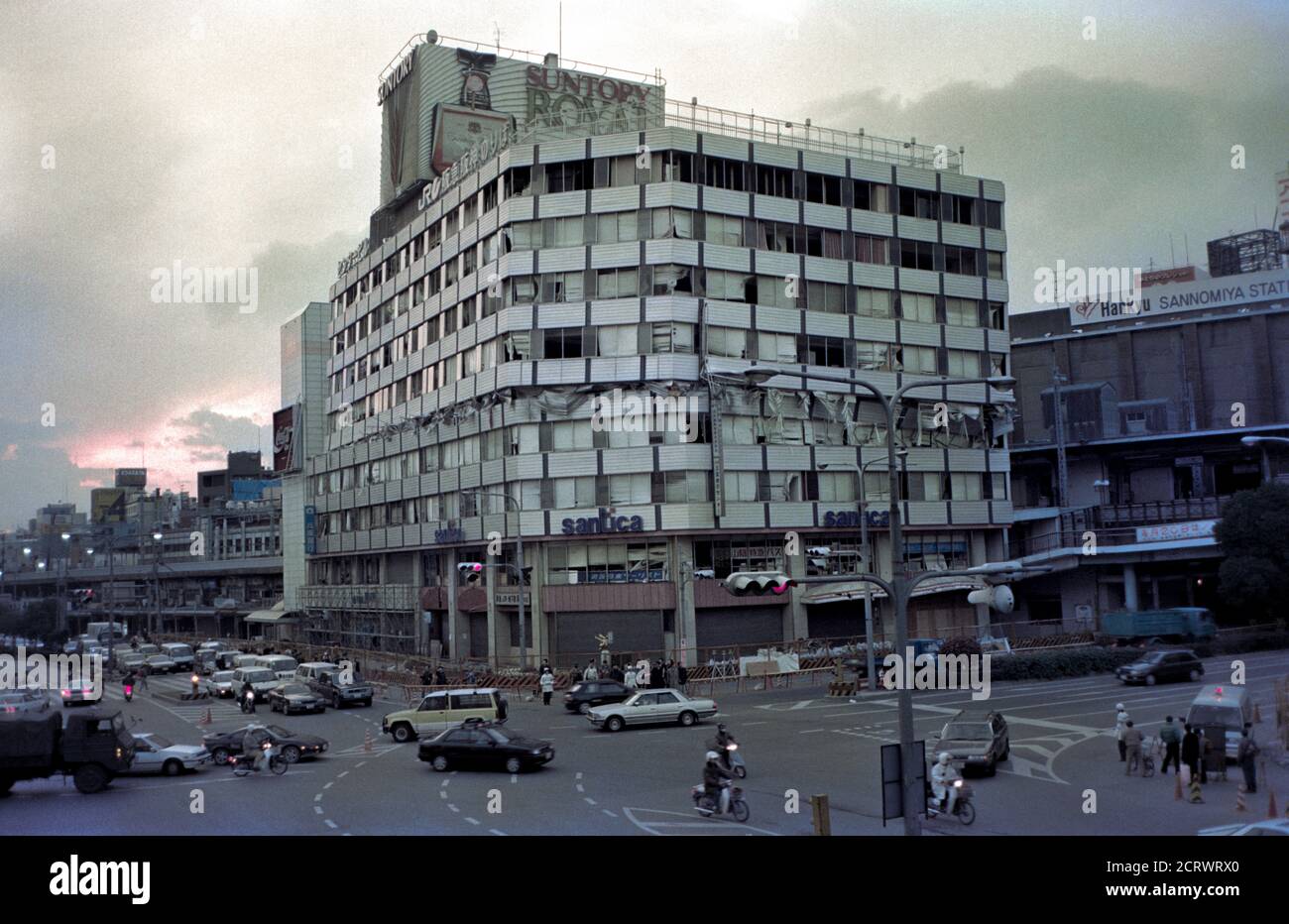 Department store building next to Hankyu Sannomiya Station collapsed in the middle from the damage caused by the 1995 Great Hanshin Earthquake in Kobe, Japan Stock Photo
