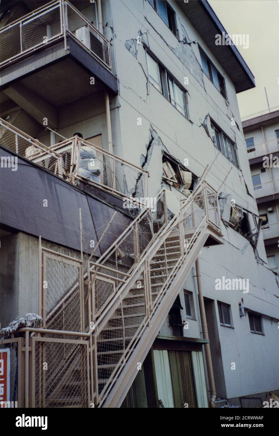 Apartment building with severe cracks and damage from the 1995 Great Hanshin Earthquake in Kobe, Japan Stock Photo