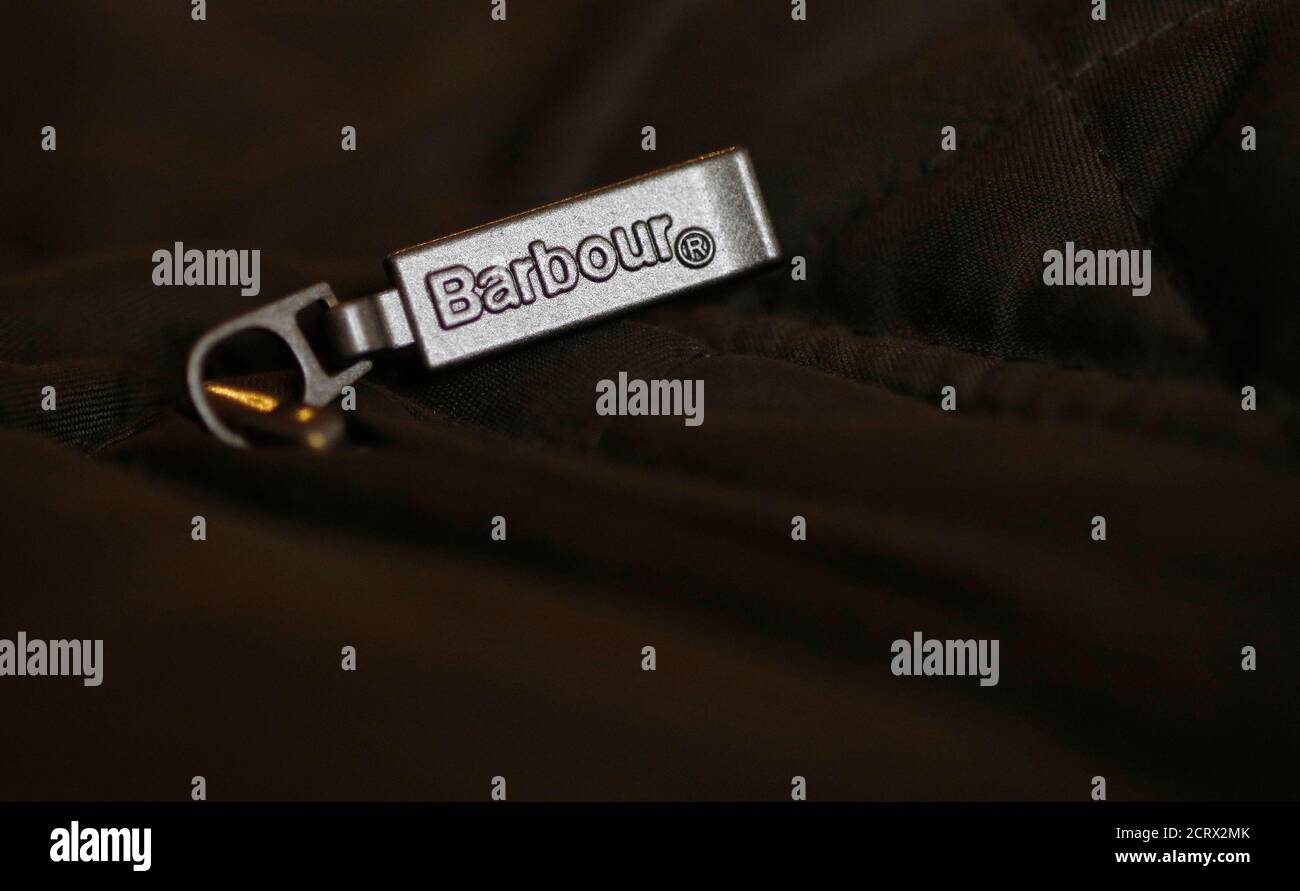 A logo of British fashion company Barbour is seen on a zip pull on a jacket  in Manchester northern England, April 7, 2016. REUTERS/Phil Noble Stock  Photo - Alamy