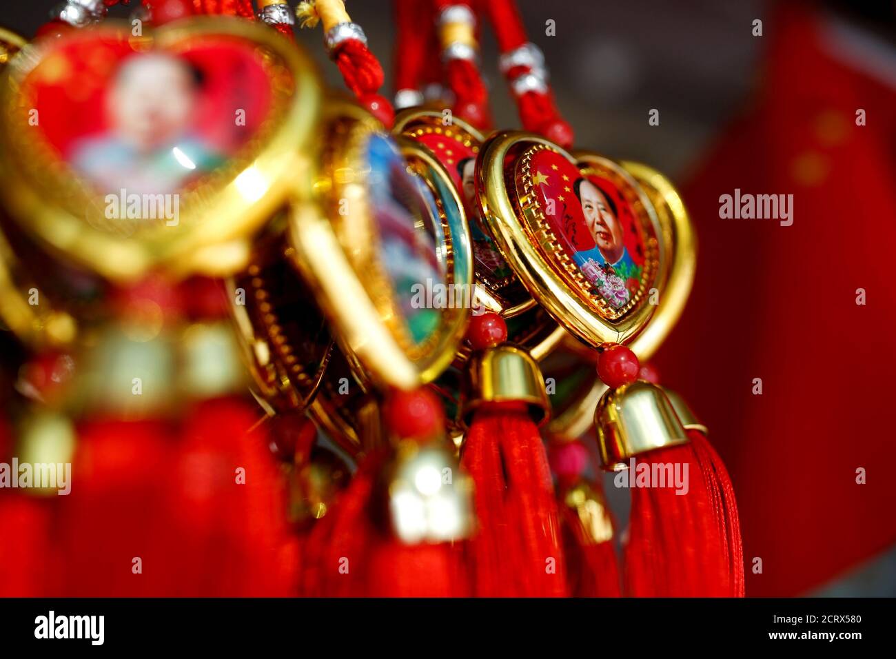 Souvenirs featuring portraits of China's late Chairman Mao Zedong are seen at a souvenir shop near the Forbidden City in Beijing, China, on the 40th anniversary of his death September 9, 2016. REUTERS/Thomas Peter Stock Photo