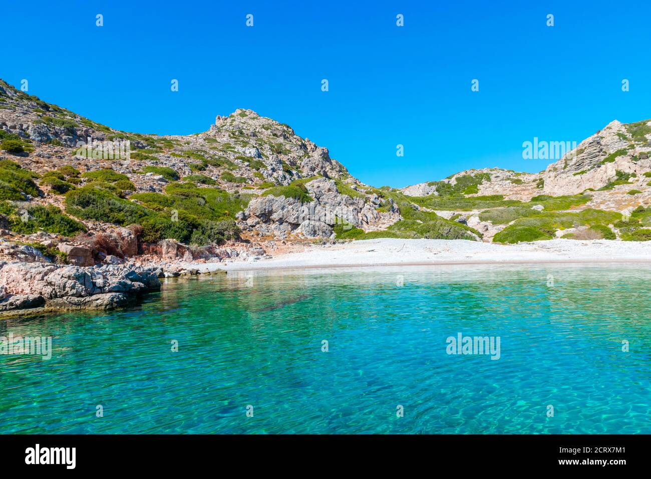 Alymounta, secluded beach with crystal clear turquoise sea on Saria Island, Karpathos Island, Greece Stock Photo