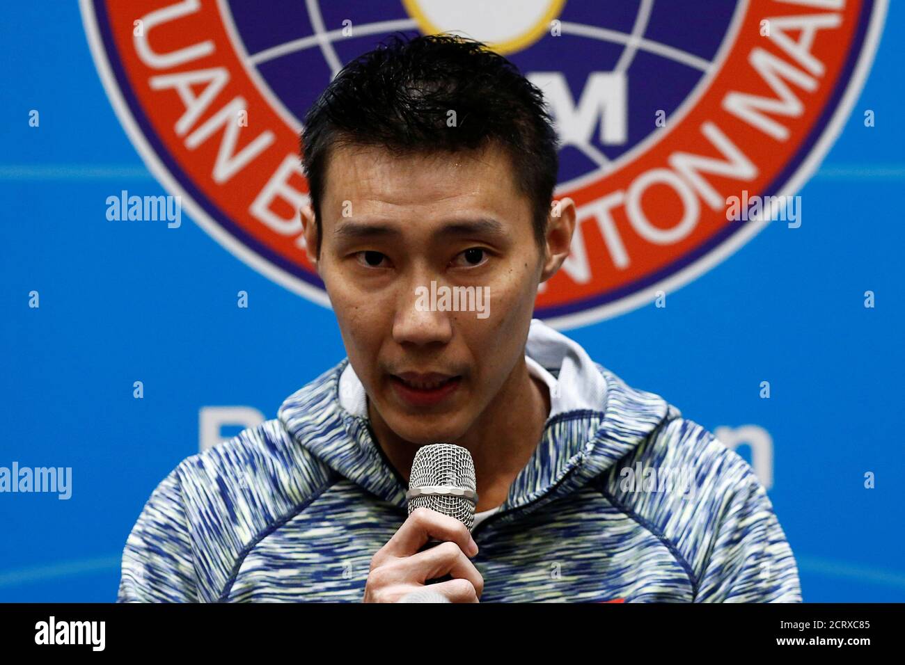 Malaysia's badminton player Lee Chong Wei poses with his wife Wong 