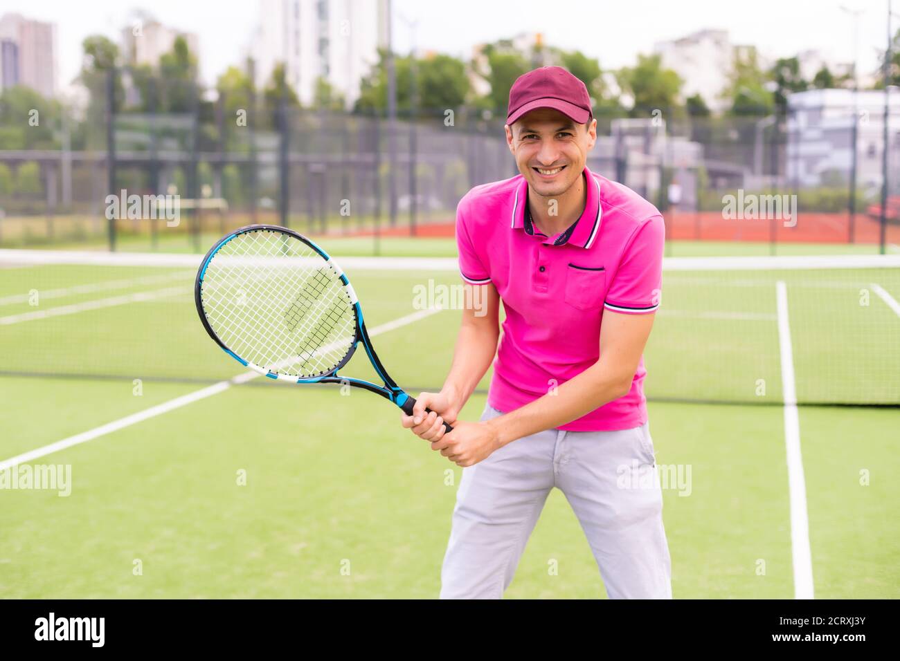 Male tennis player on the tennis court Stock Photo Alamy