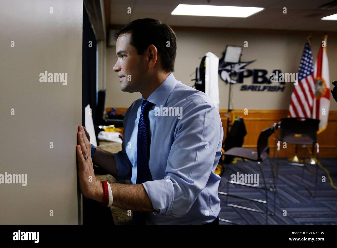 Republican U.S. presidential candidate Marco Rubio peeks into the arena before being introduced at a campaign event at Palm Beach Atlantic University in West Palm Beach, Florida March 14, 2016.     REUTERS/Carlo Allegri     TPX IMAGES OF THE DAY Stock Photo