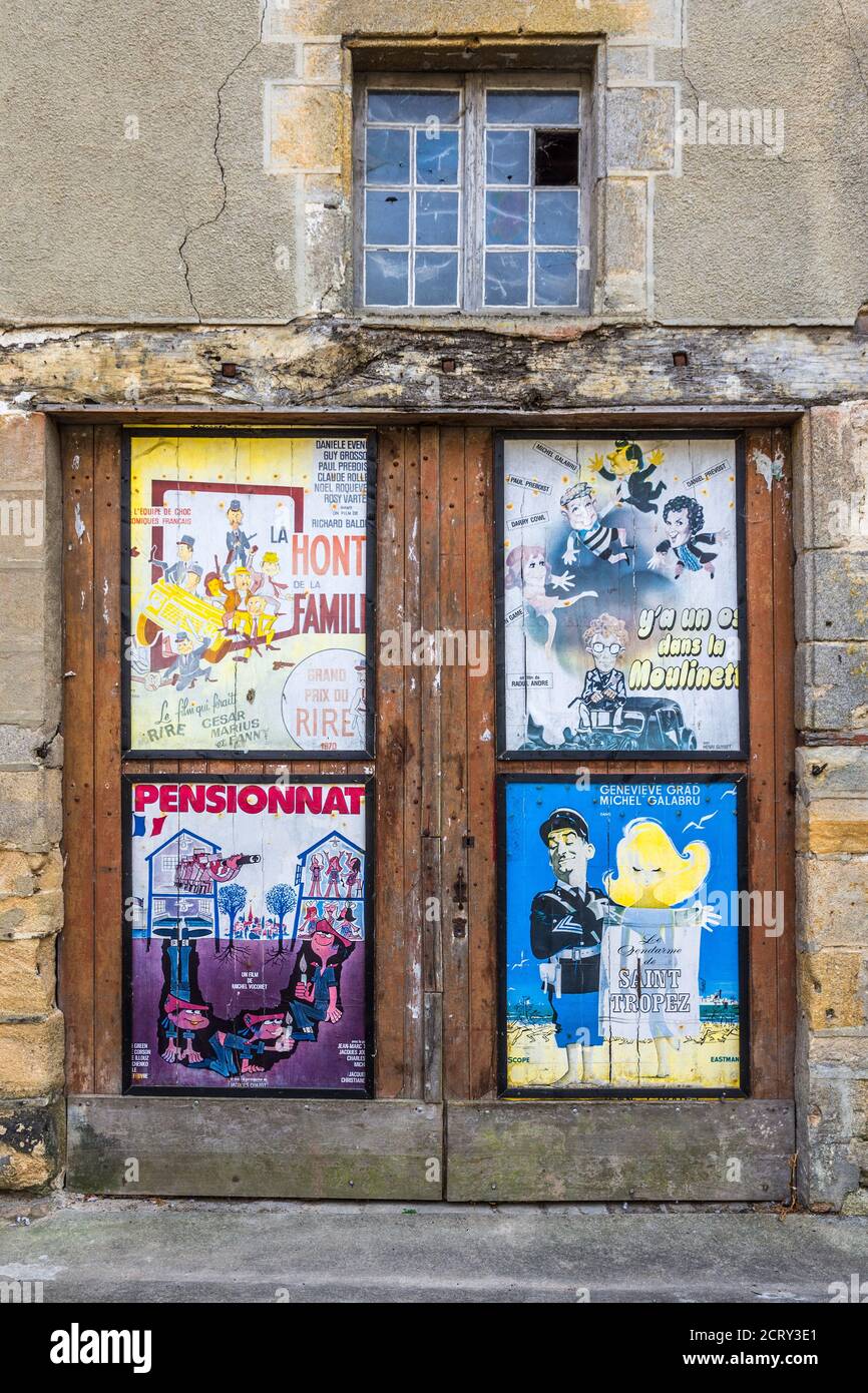 Reproduction 1960s and 1970s French film posters used as street decoration in Saint-Benoit-du-Sault, Indre (36), France. Stock Photo