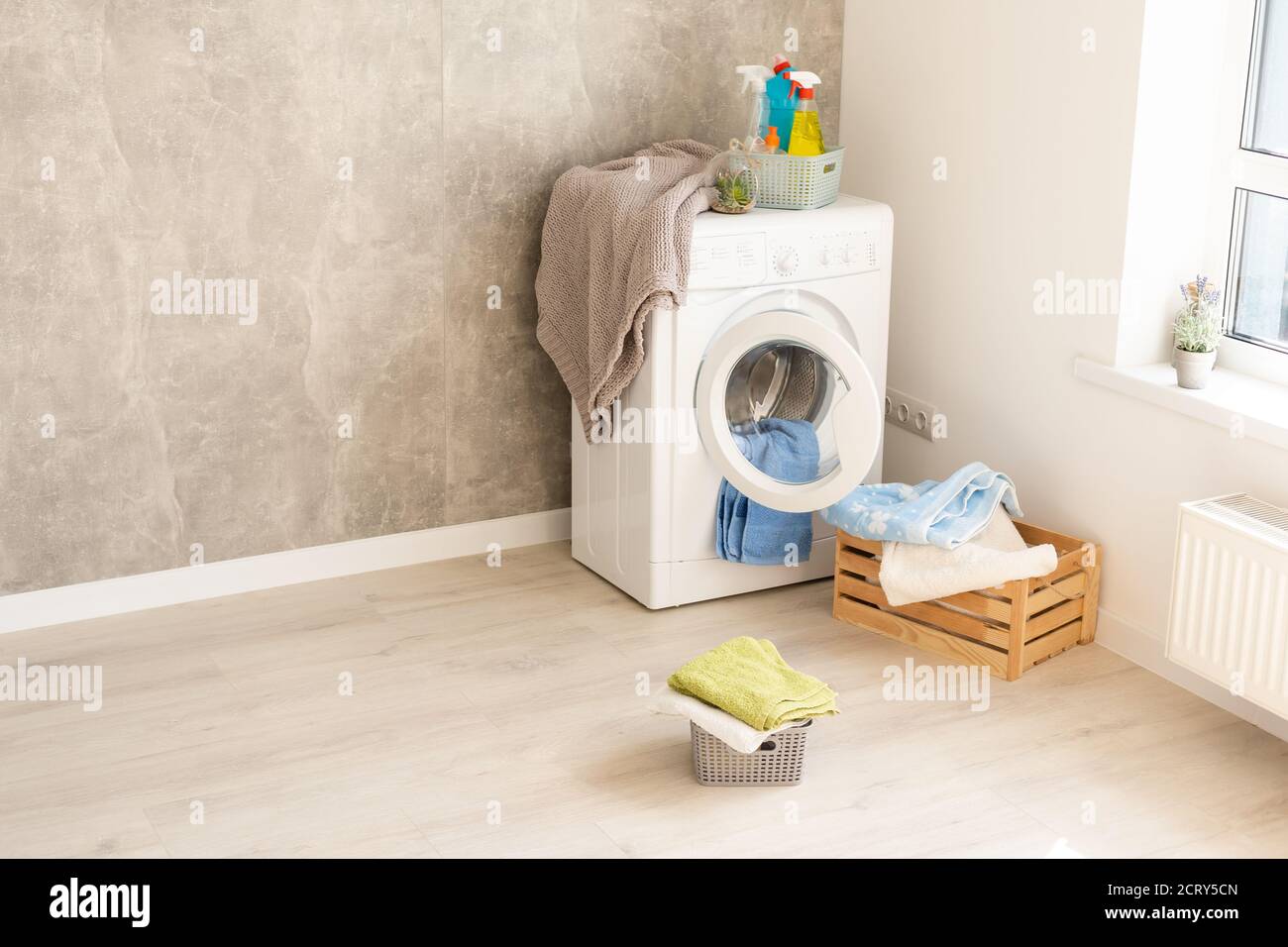 Laundry room in new apartment Stock Photo - Alamy