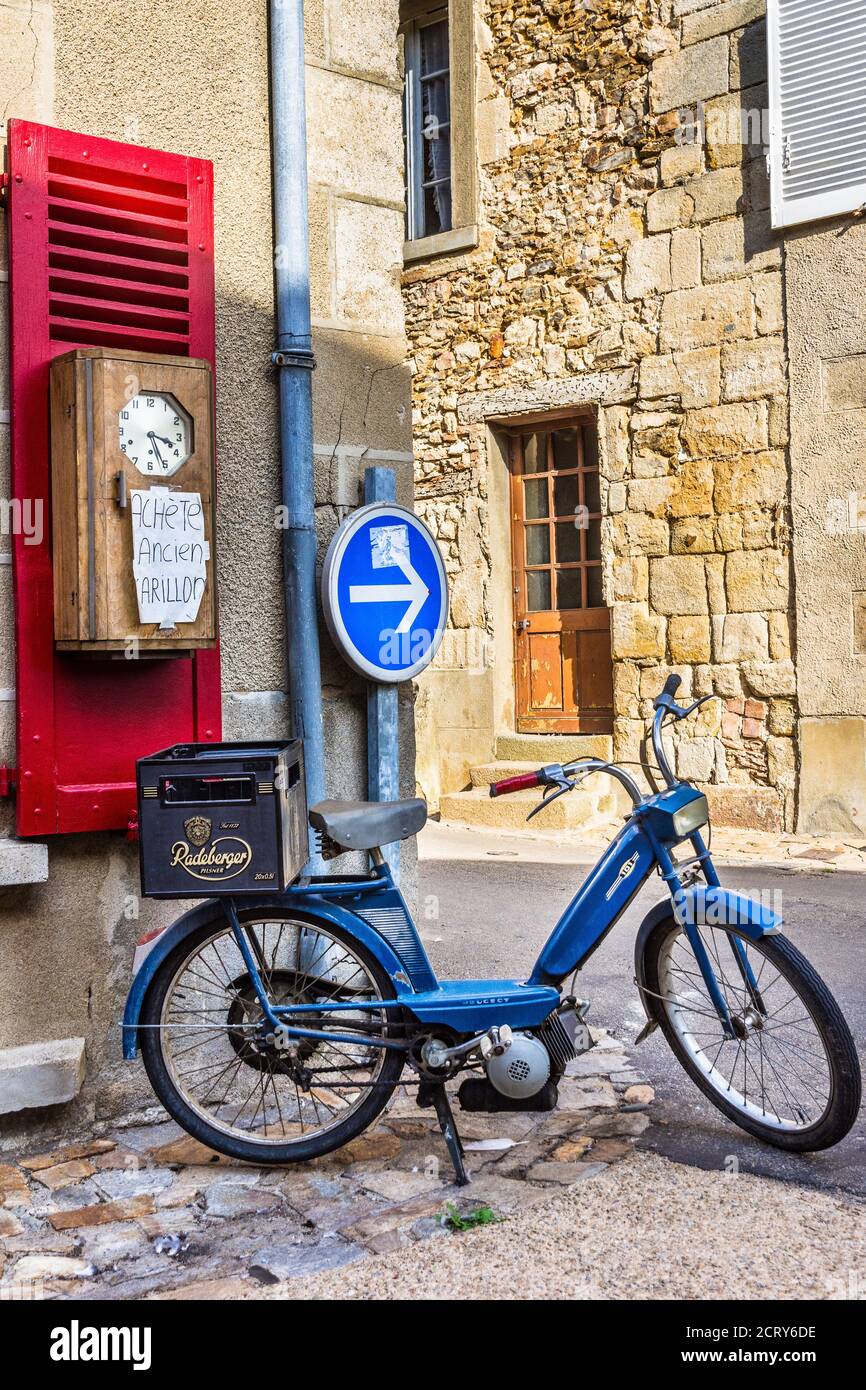 Old Peugeot 101 moped on street corner in Saint-Benoit-du-Sault, Indre (36), France. Stock Photo