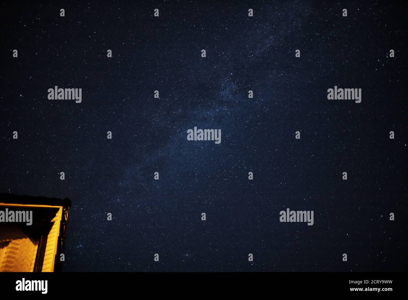 above a residential house many stars shine in the night sky Stock Photo ...
