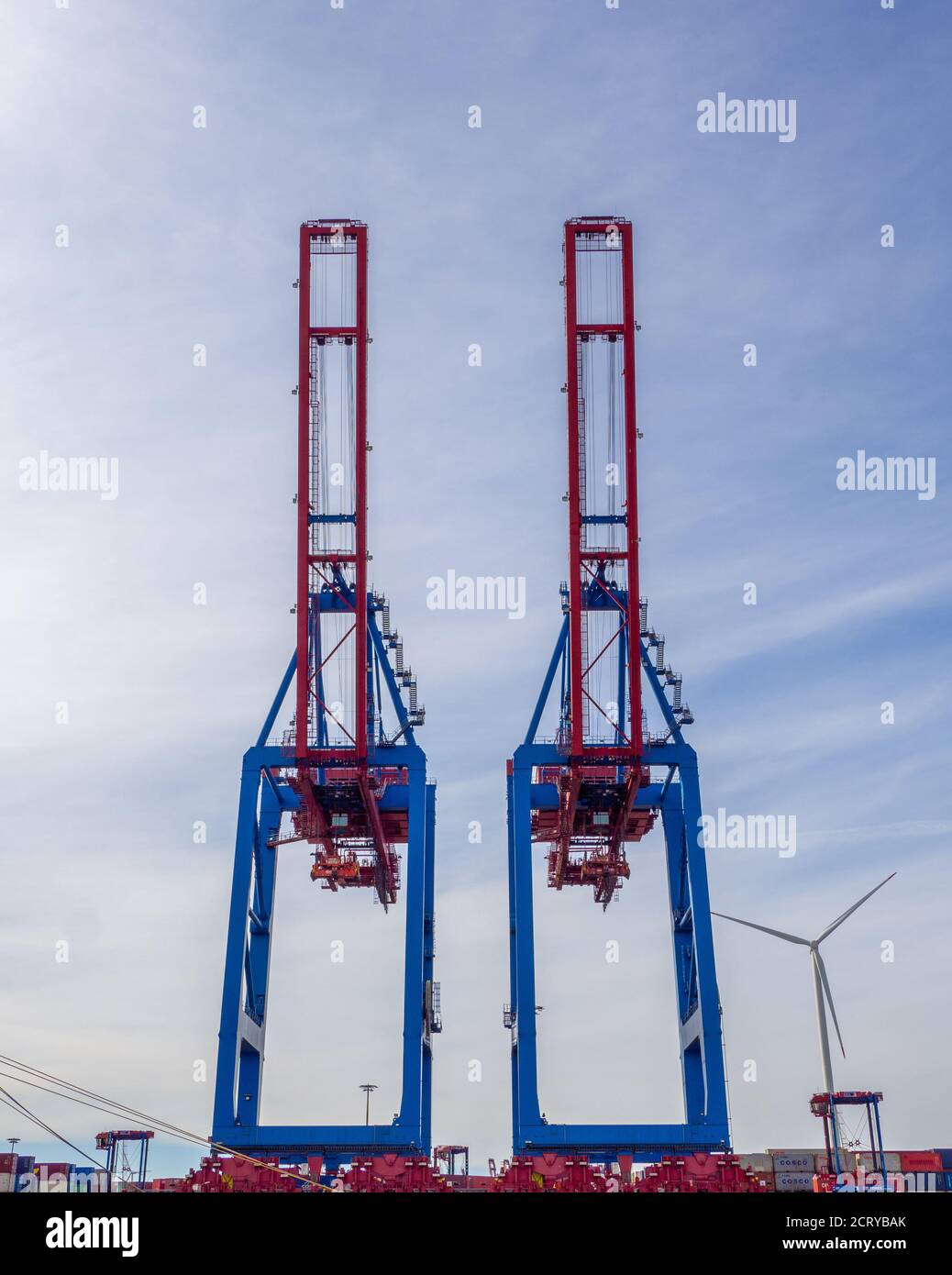 in a port there are cranes for loading and unloading ships Stock Photo ...