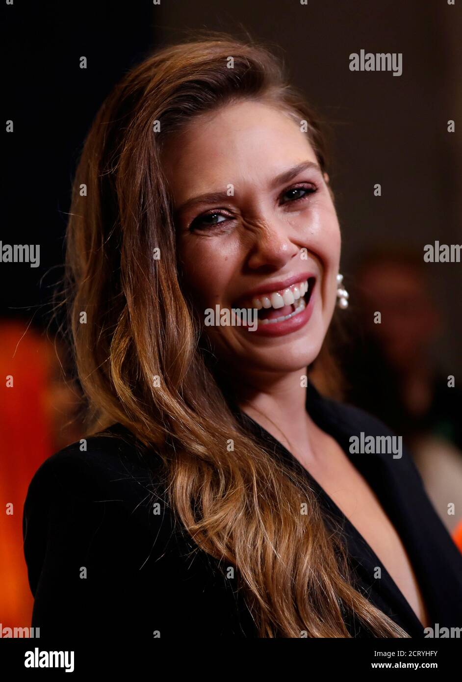 Actor Elizabeth Olsen poses at the premiere of Sorry for Your Loss