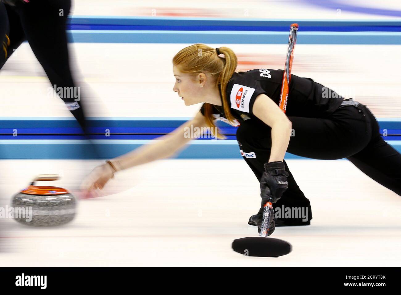 Germany's Stella Heiss delivers a stone during her curling round robin game against Russia at the World Women's Curling Championships in Sapporo March 18, 2015.  REUTERS/Thomas Peter (JAPAN - Tags: SPORT CURLING) Stock Photo