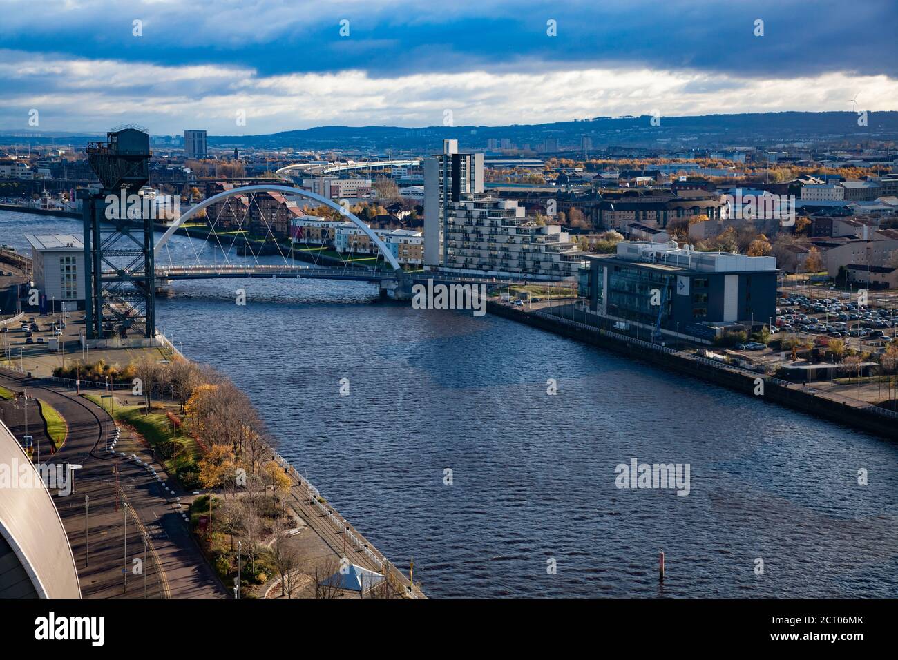 Glasgow / Scotland - Nov 13, 2013: Autumn view. Clyde river embankment, water and Squinty Bridge. Aerial panorama. Blue sky with clouds. Stock Photo