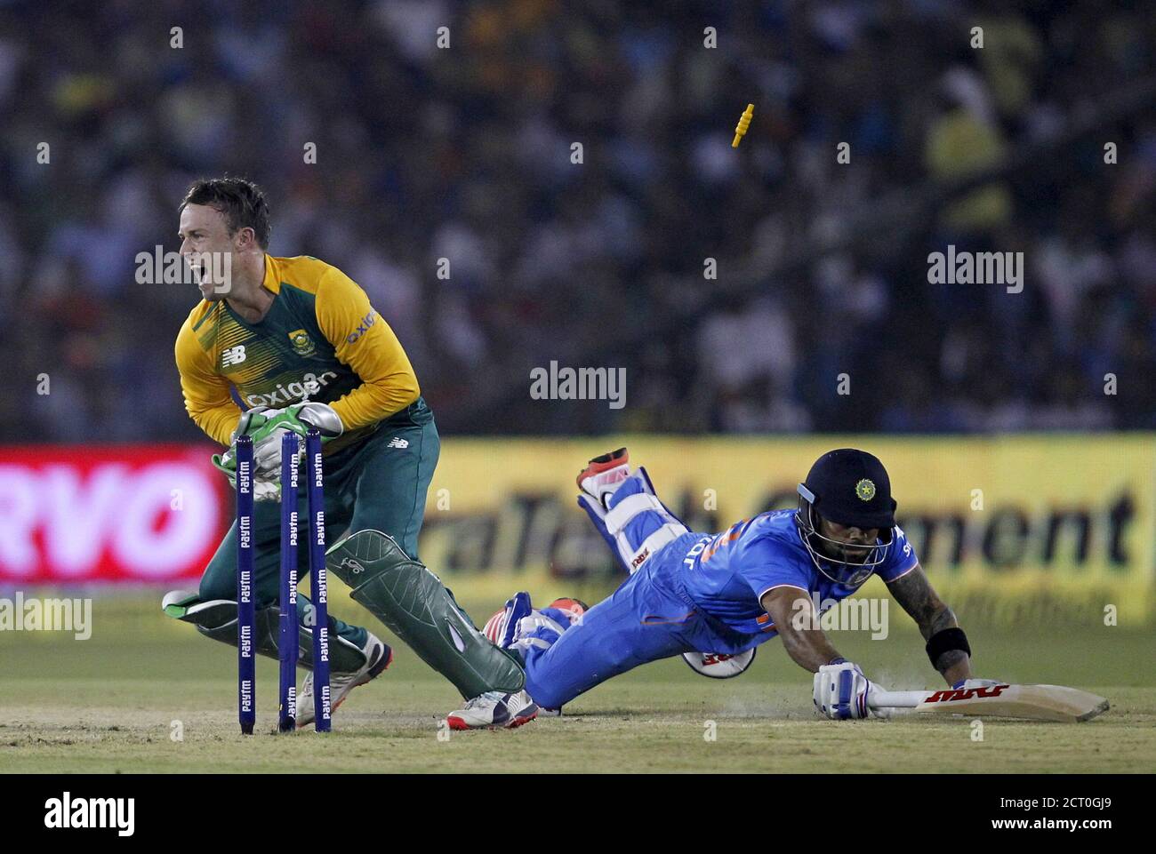 India's Virat Kohli dives to make the crease as he is run out by South Africa's AB de Villiers during their second Twenty20 cricket match in Cuttack, India, October 5, 2015. REUTERS/Danish Siddiqui Stock Photo