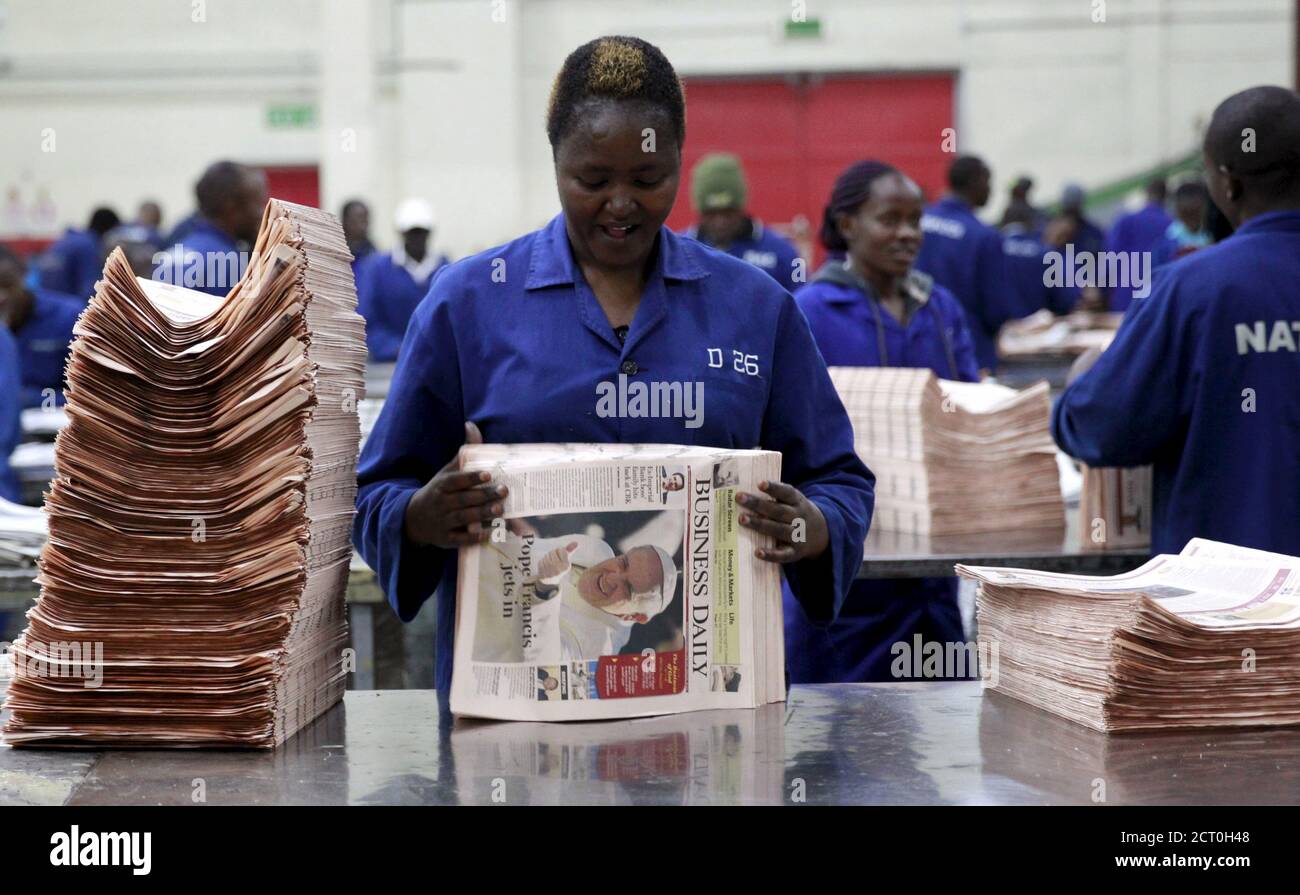 Newspaper worker printing press hires stock photography and images Alamy