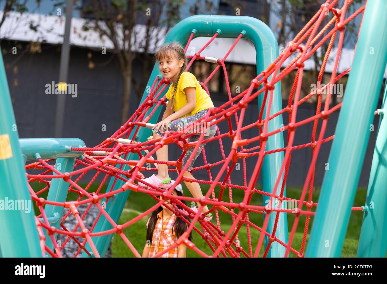 Happy children playing outdoors, children on the playground Stock Photo ...