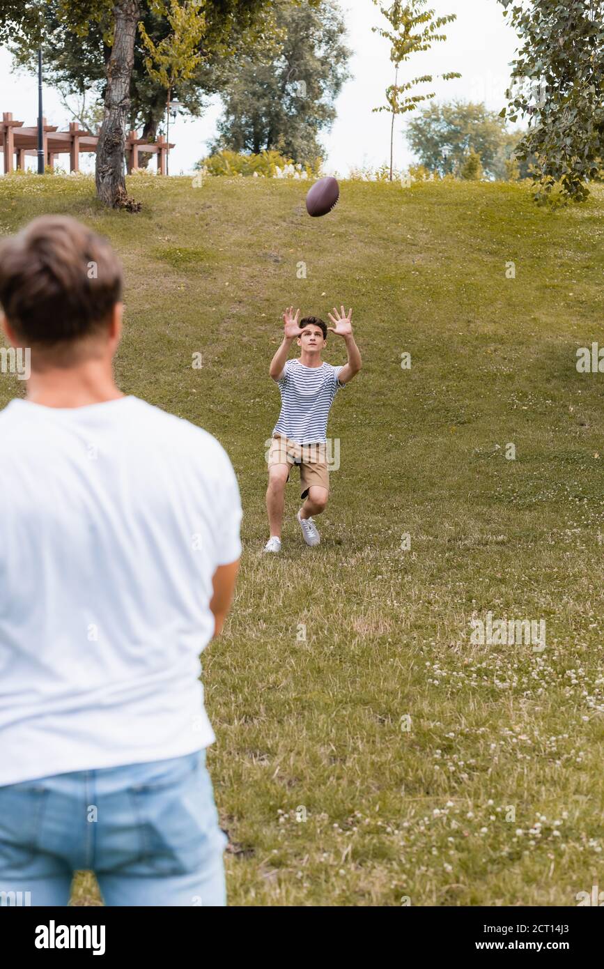 Catching rugby ball hi-res stock photography and images - Alamy