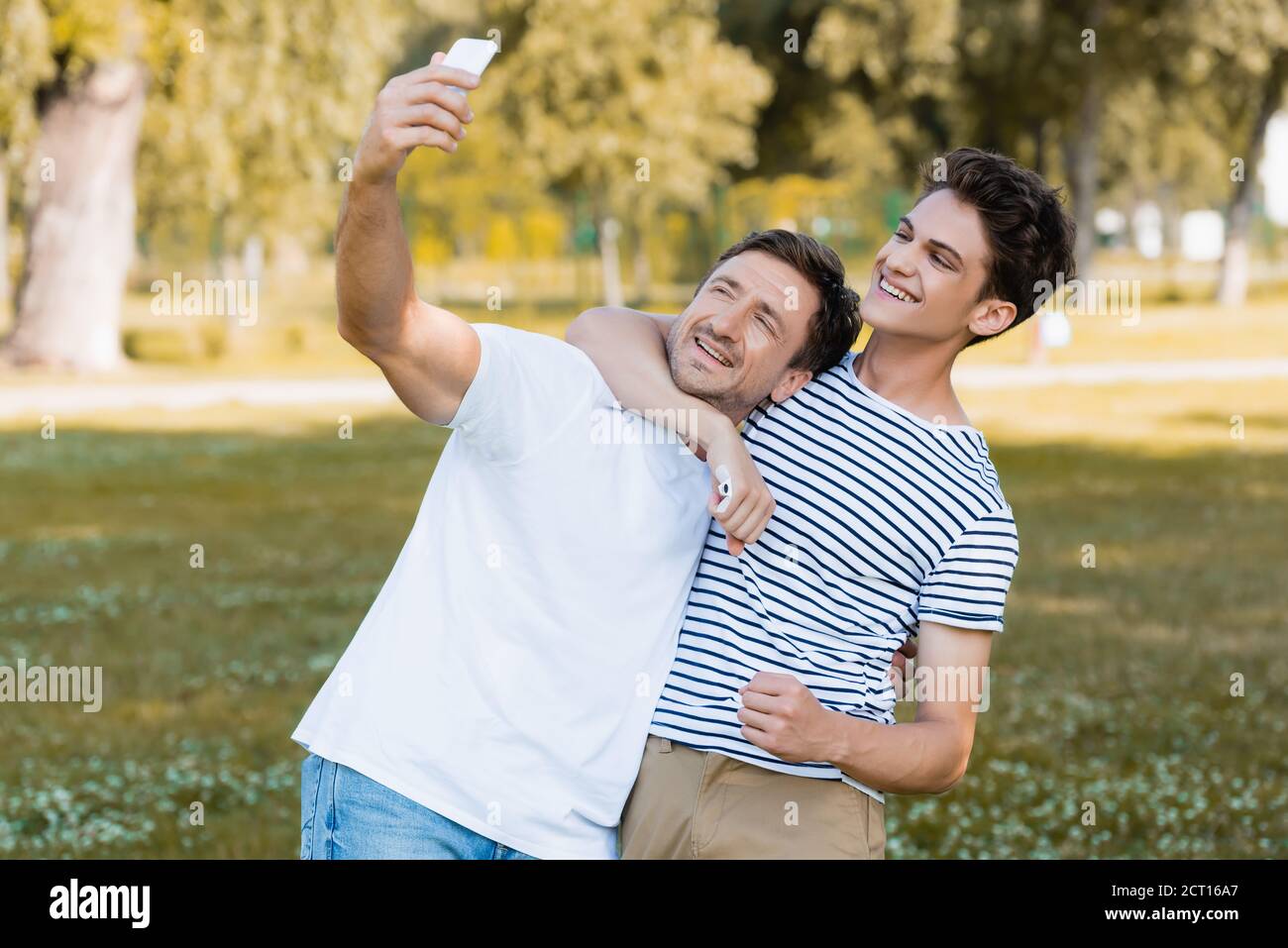 Son hugging father hi-res stock photography and images - Alamy