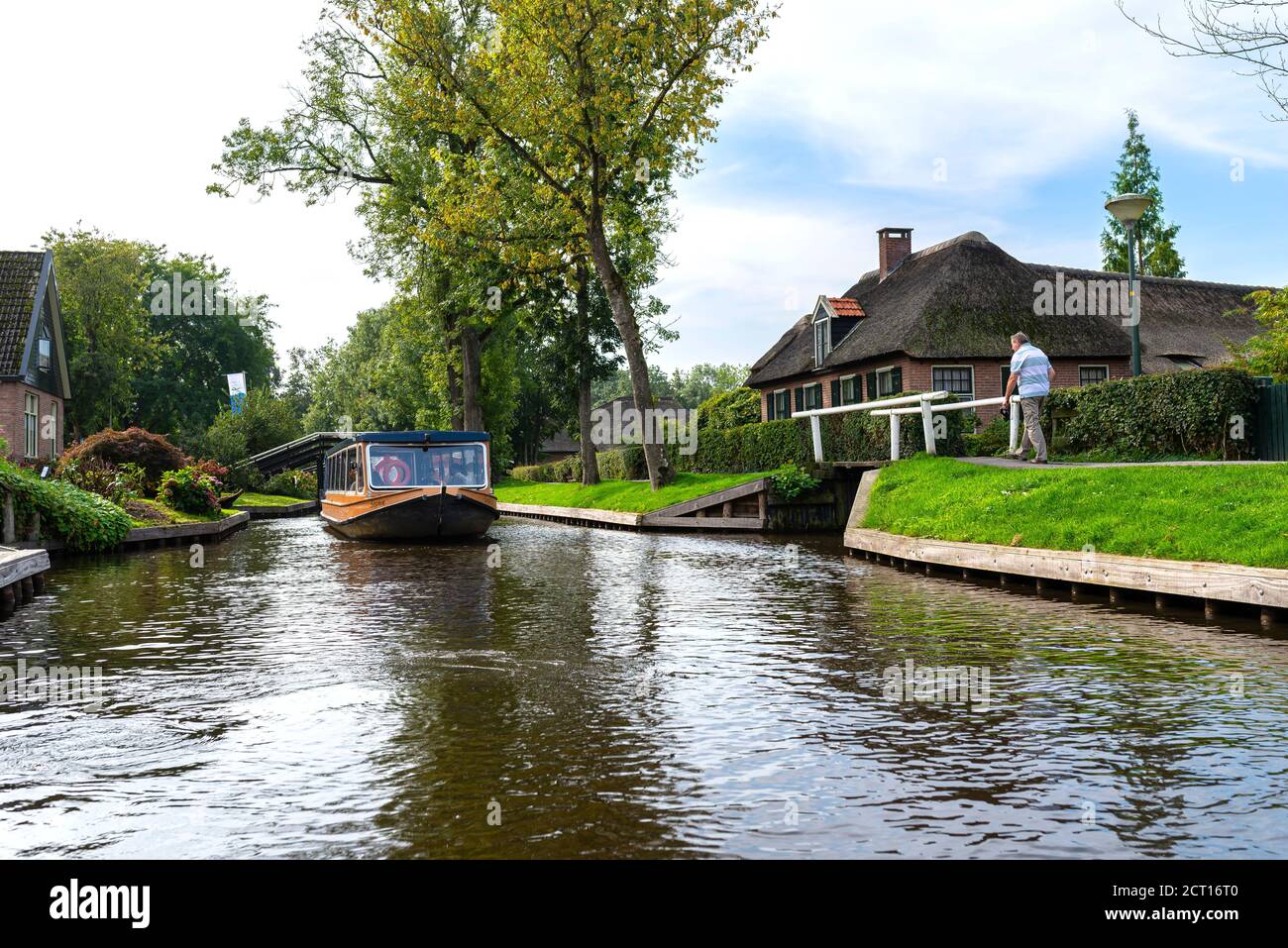 Giethoorn, Netherlands - 13 September 2020. Beautiful thatched buildings in the famous village of Giethoorn in the Netherlands with water canals. The Stock Photo