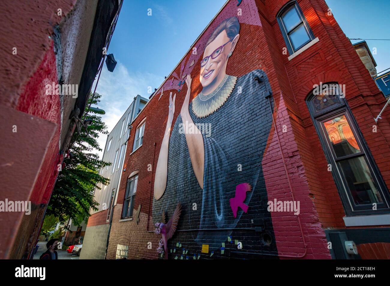 Washingtonians pay their respects to Justice Ruth Bader Ginsburg with messages and flowers at a mural in NW Washington, Saturday, 19 September 2020. Stock Photo