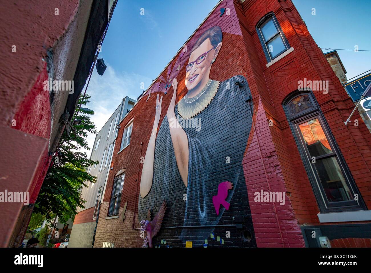 Washingtonians pay their respects to Justice Ruth Bader Ginsburg with messages and flowers at a mural in NW Washington, Saturday, 19 September 2020. Stock Photo