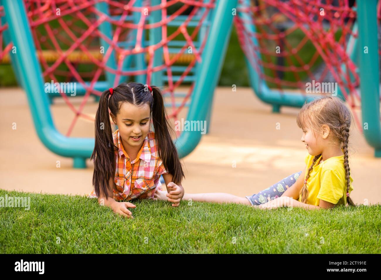 Happy children playing outdoors, children on the playground Stock Photo ...
