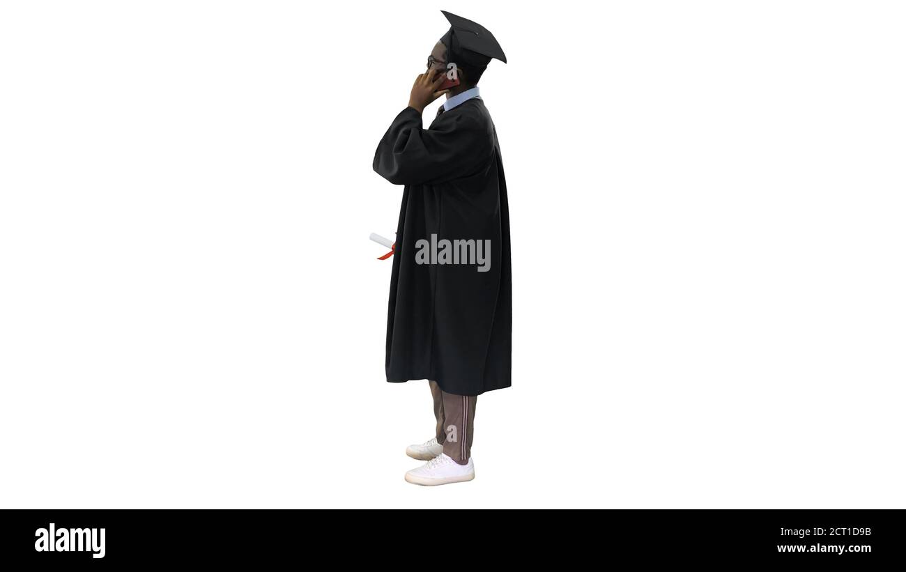 Smiling african american male student in graduation robe talking Stock Photo