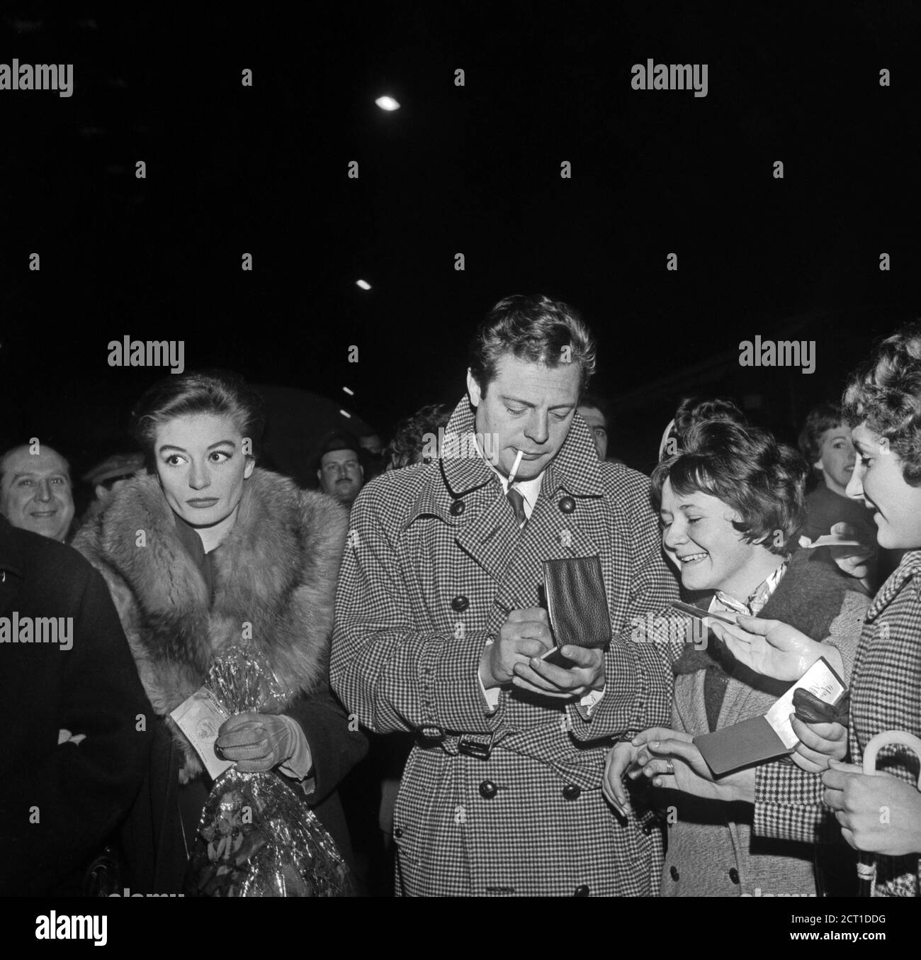 Anouk Aimée and Marcello Mastroianni attending the premiere of the movie 'La Dolce Vita' (Milan, february 1960). Stock Photo