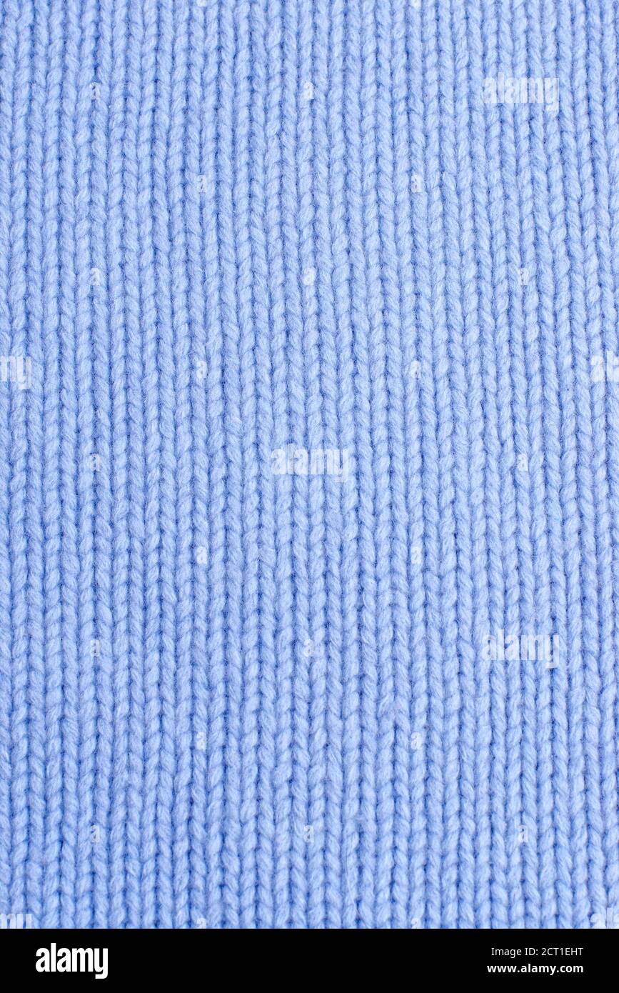 Vertical closeup of seamless blue knitted fabric texture Stock Photo ...