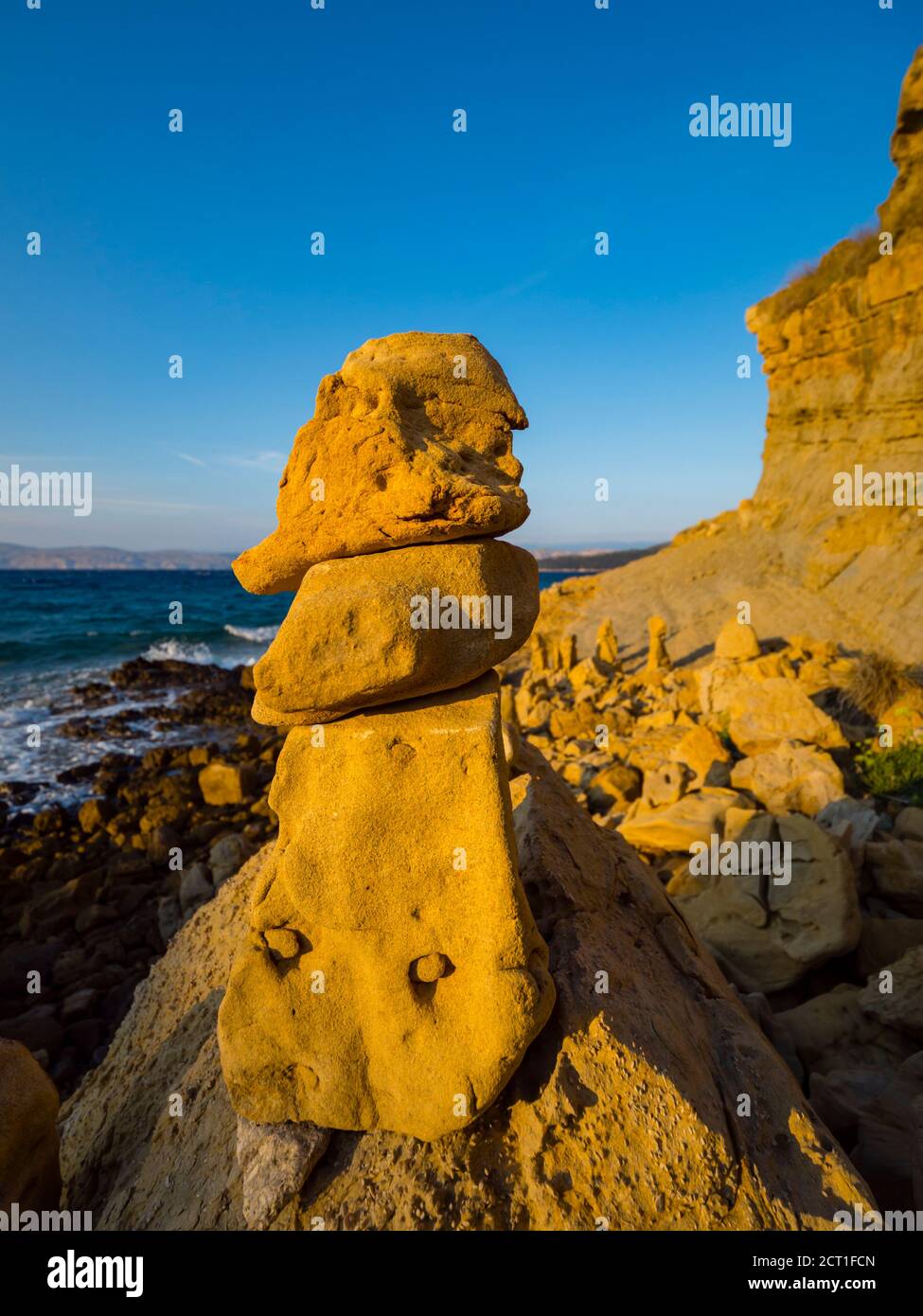Piled stacked rocks on beach balance balancing tertiary marls and sandstones of the Lopar peninsula on Rab island Croatia Europe Stock Photo