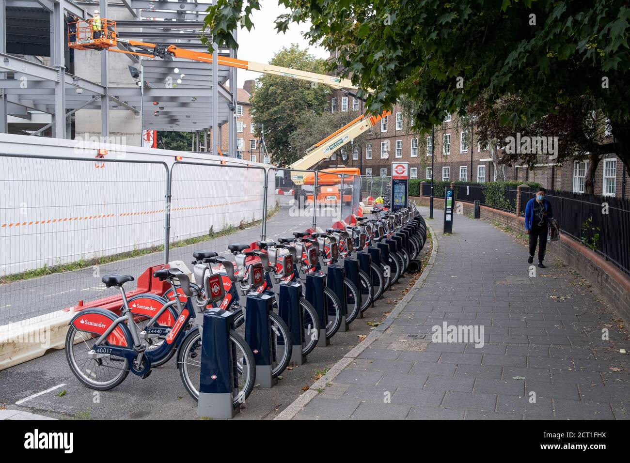 A pedestrian walks past the disruption on Kennington Oval during construction work at the Oval cricket ground, on 16th September 2020, in London, England. Stock Photo