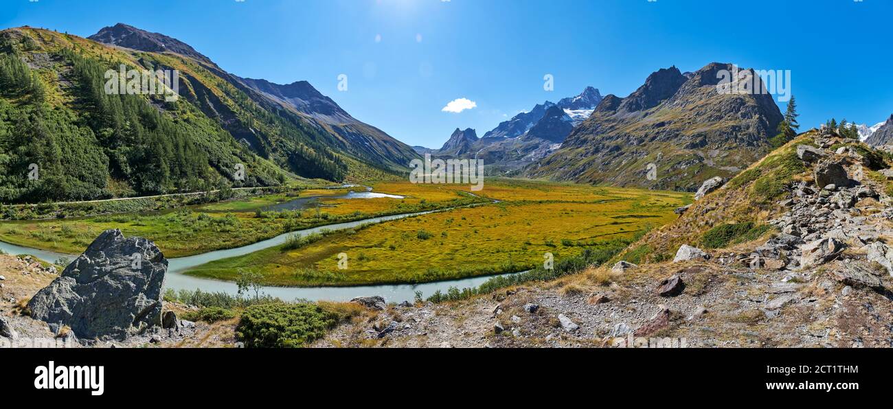 Scenic view of the Italian Alps from the Mont Blanc massif with the Val Veny valley and Lake Combal in summer Stock Photo