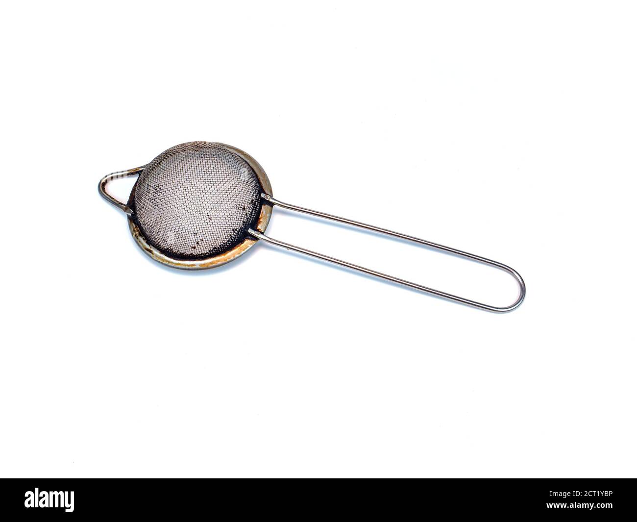 Metal strainer for coffee and tea on a white background. Making tea and