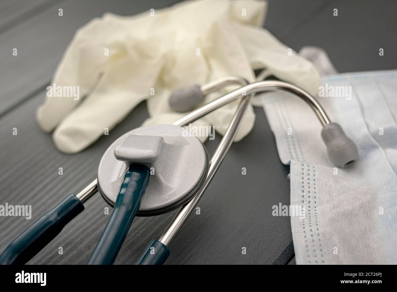 Personal protective equipment for doctors and nurses in a Hospital. Gloves, stethoscope and face mask. Stock Photo