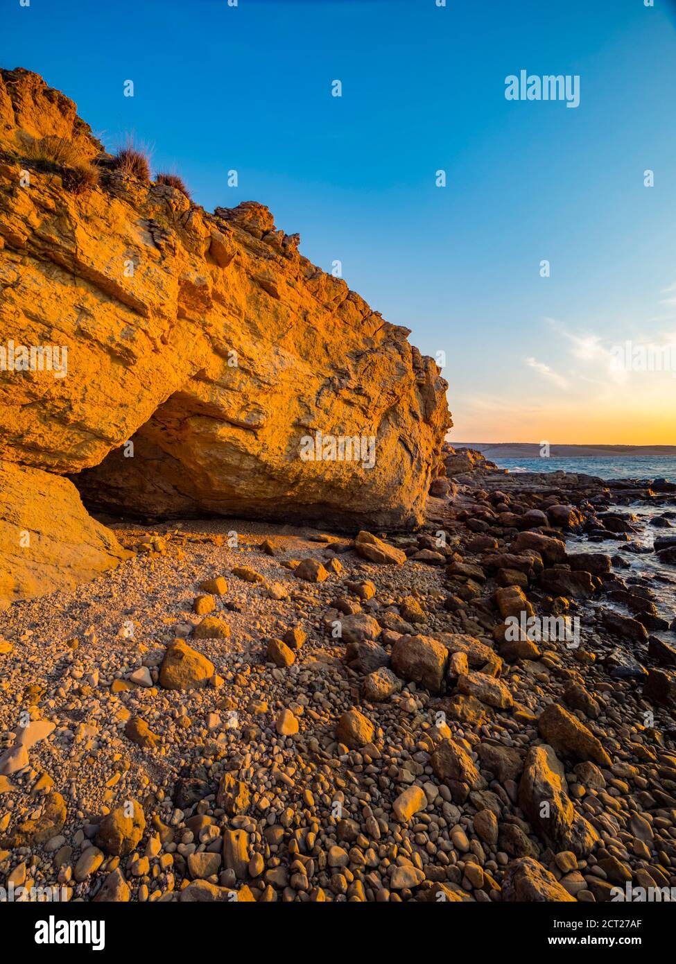 Small cave entrance on beach tertiary marls and sandstones of the Lopar peninsula on Rab island Croatia Europe Stock Photo