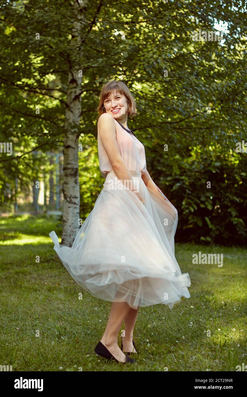 Beige dress hi-res stock photography and images - Alamy Beige dress hi-res stock photography and images - Alamy